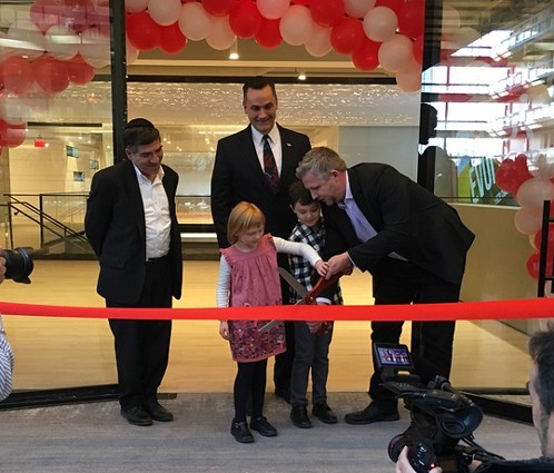 Photo: Ralph Zucker, Gregory Buontempo, Colin Day and the Day children cut the ribbon at iCIMS. Photo Credit: Esther Surden