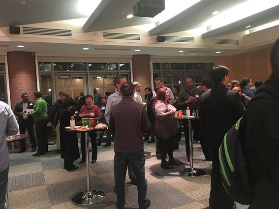 Photo: Networking at the 2016 Princeton Tech Meetup holiday event Photo Credit: Esther Surden
