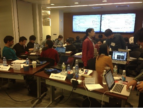 Photo: Teams working on their projects at the Juniper-Comcast Hackathon Photo Credit: Juniper