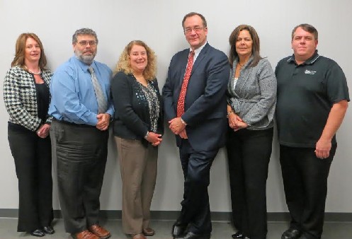 Photo: IBS has become an employee-controlled organization. Pictured are the six senior level management employees appointed to the newly created management advisory team. Photo Credit: Courtesy IBS