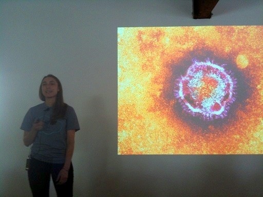 Photo: Tiffany Bogich talks about PLOM.io which makes model-based science social. Photo Credit: Esther Surden