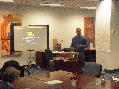 Photo: Rafael Balbi teaches a lean workshop in Newark. Photo Credit: Lean Newark