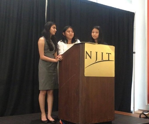 Photo: Team Girl Unity presents their website. Photo Credit: Courtesy Girls Who Code