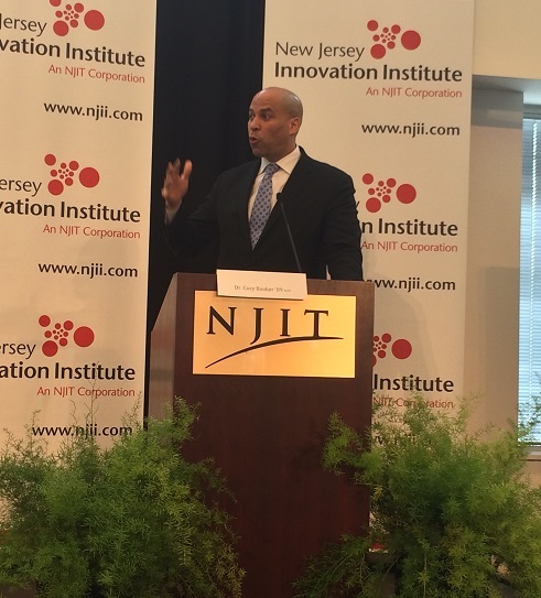 Cory booker speaks at an NJII event
