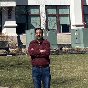 Liaquat Hossain in front of the Montclair State University School of Computing | Courtesy L Hossain