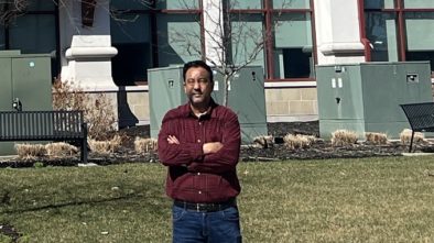 Liaquat Hossain in front of the Montclair State University School of Computing | Courtesy L Hossain