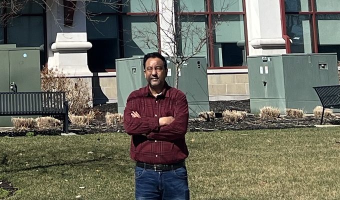 Liaquat Hossain in front of the Montclair State University School of Computing | Courtesy L Hossain